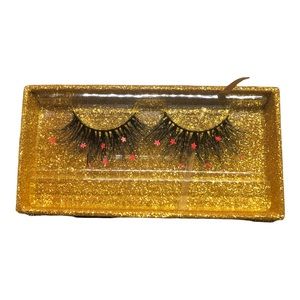 Natural lashes with red star shaped sparkles with magnetic lash pen.